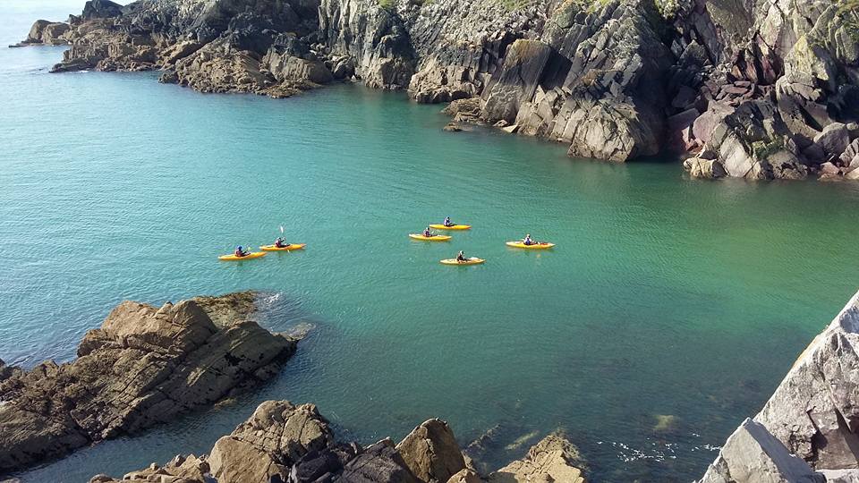 Kayakers from the top of Porth-Clais