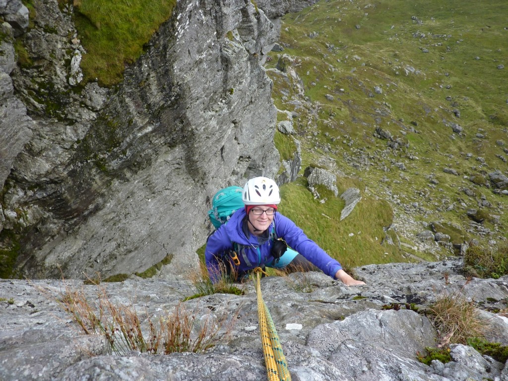 Mara arriving at the top of Punster's Crack
