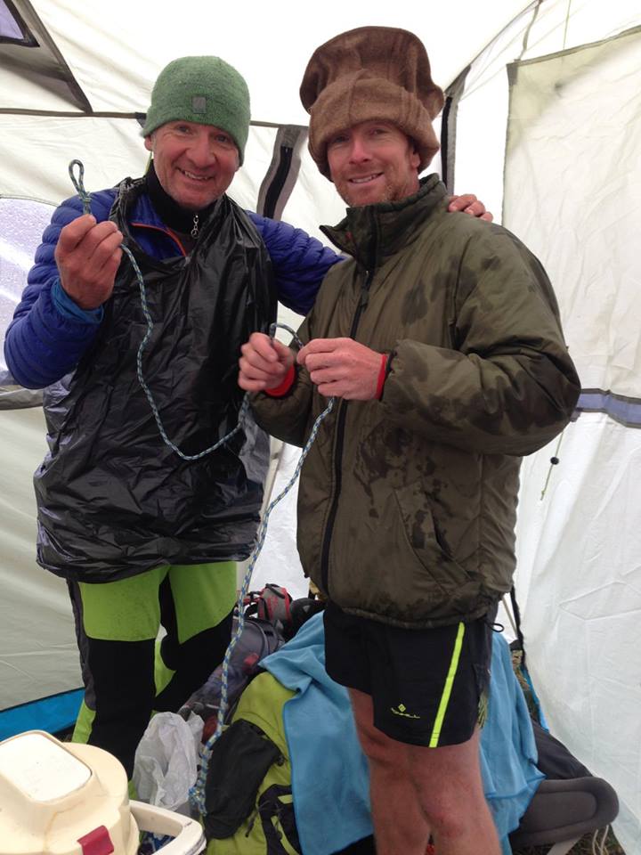 John & Guy performing tent repairs during a bit of a storm...
