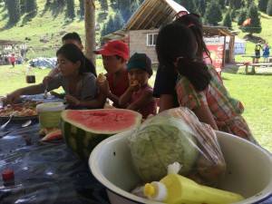Local children and some melons (a very popular fruit in Kyrgyzstan)
