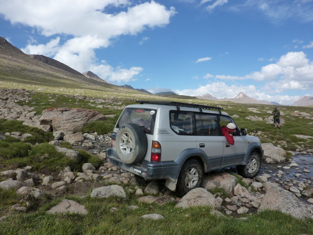 Misha negotiating a rocky river crossing in the Landcruiser