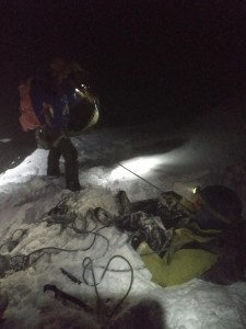 Will McEvoy, lowering his Dad, John, down on a bucket belay to investigate the exit slopes.